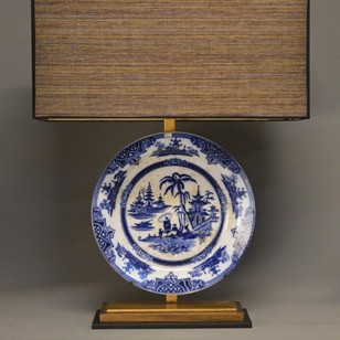 Single unique plate-charger mounted as lamp